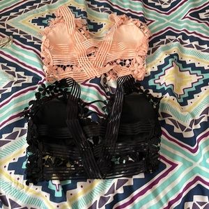 Pink and black bras